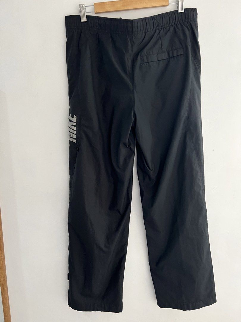 Nike Nylon track pants (Category: Activewear) located in Muntinlupa City. Submitted by thriftdripbyjm (Listing ID 1459969076, Image 2). Description: Color rate: 10/10 as new Dimes: 17x40 ( S on tag) Hemlime: 8 Issue: crack prints (or design talaga yun) Price: 1850 + sf.