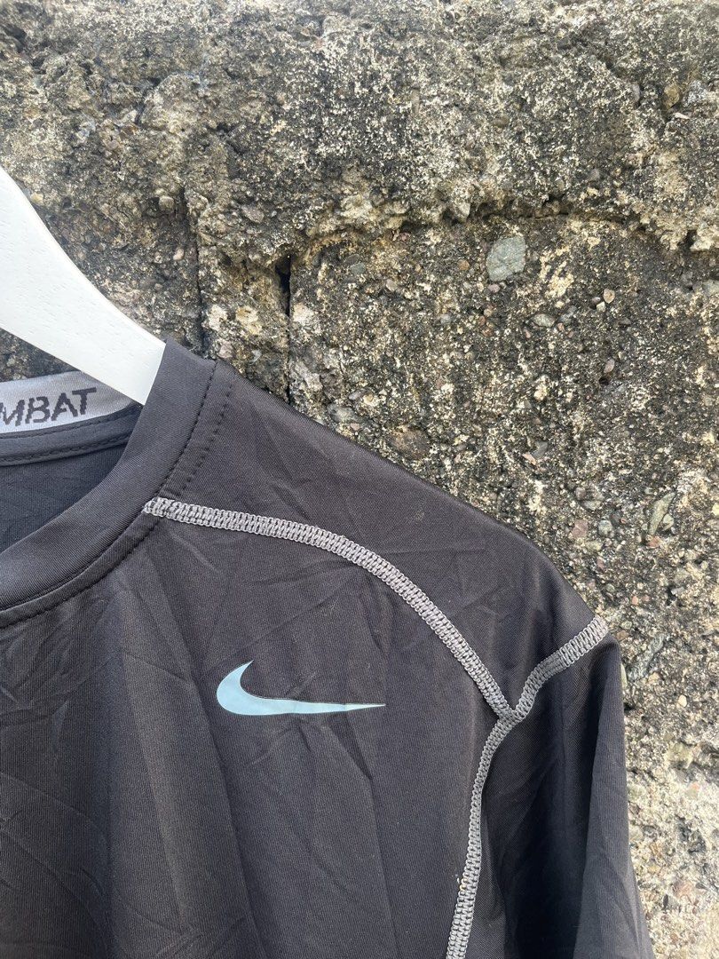 Nike Pro Combat Dri-Fit T-shirt XL (Category: Activewear) located in Manila. Submitted by christian048 (Listing ID 1460072821, Image 2). Description: - Brand: Nike Pro Combat - Color: Black - Size: XL - Sleeve Length: Short sleeves - Neckline: Crew neck - Features: Dri-Fit material for moisture-wicking - Best For: Workouts, athletic activities, everyday wear - Condition: Please check photos for detailed condition..