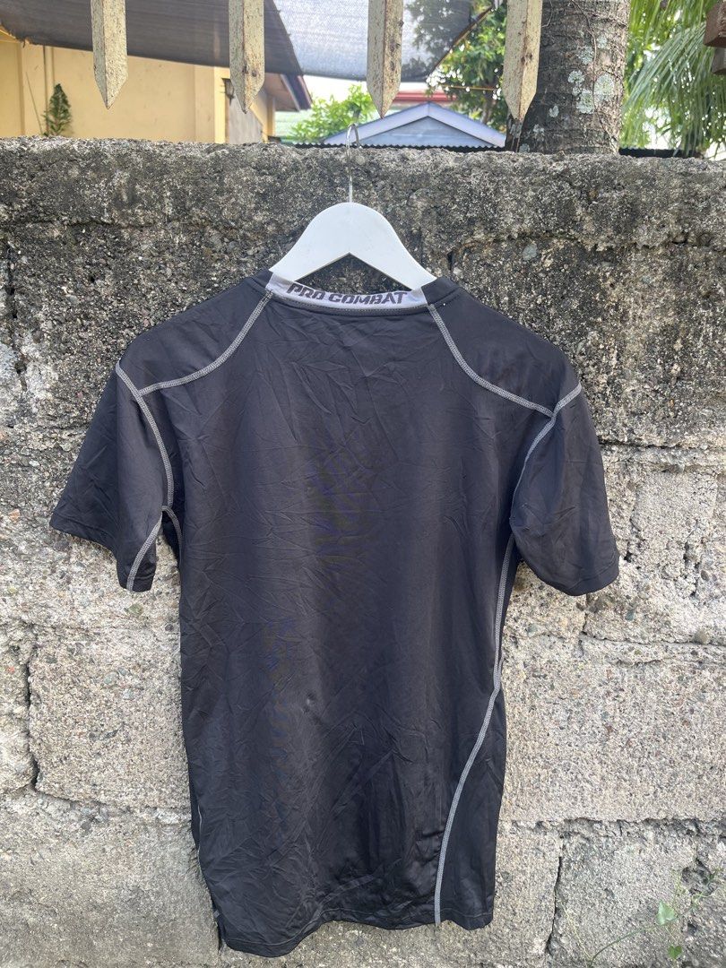 Nike Pro Combat Dri-Fit T-shirt XL (Category: Activewear) located in Manila. Submitted by christian048 (Listing ID 1460072821, Image 3). Description: - Brand: Nike Pro Combat - Color: Black - Size: XL - Sleeve Length: Short sleeves - Neckline: Crew neck - Features: Dri-Fit material for moisture-wicking - Best For: Workouts, athletic activities, everyday wear - Condition: Please check photos for detailed condition..