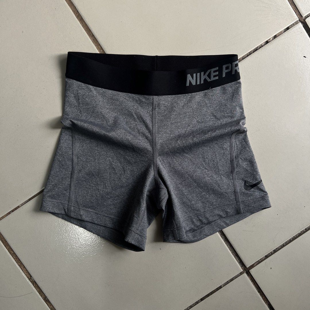 Nike Pro Dri-Fit Grey Compression Shorts XS (Category: Activewear) located in Diplahan. Submitted by denpaks_thrift. (Listing ID 1460011833, Image 1). Description: - Grey Nike Pro Dri-Fit compression shorts - Size XS - Made in Cambodia - Ideal for workouts or everyday wear - Provides a comfortable and supportive fit - Features elastic waistband with Nike Pro branding.