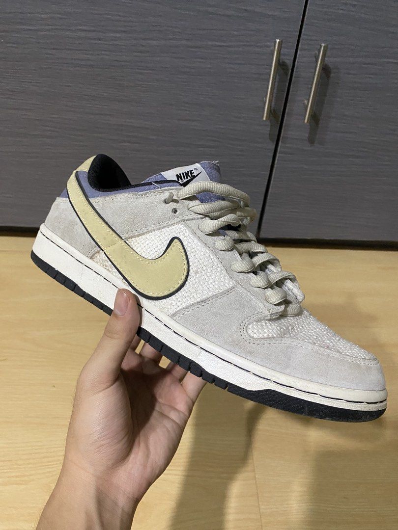 Nike SB Dunk Low Light Smoke Grey (Category: Sneakers) located in Manila. Submitted by gian_0444 (Listing ID 1460021083, Image 2). Description: Nike SB Dunk Low in Light Smoke Grey. Features a mix of suede and textured fabric. Tan Swoosh detail. Classic skate shoe silhouette. Good for everyday wear or skating..