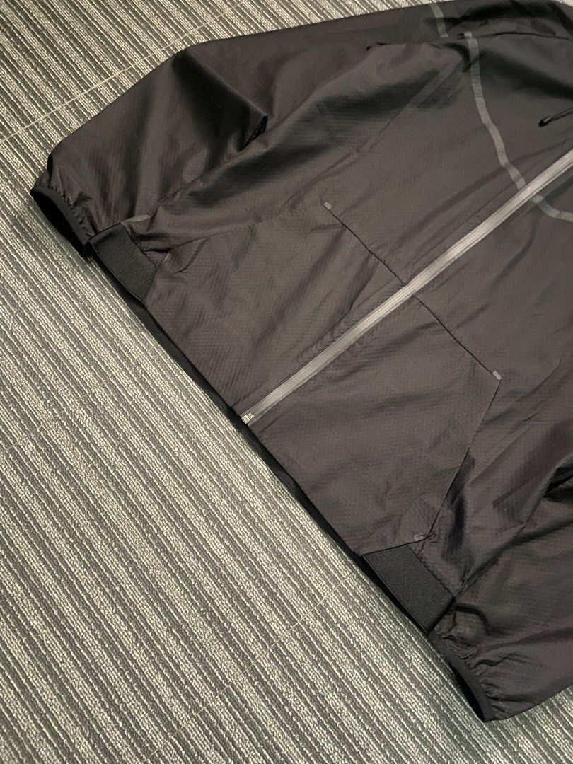 Nike Tech Aeroshield Windbreaker (Category: Coats, Jackets and Outerwear) located in Iloilo. Submitted by chillbill11 (Listing ID 1459988489, Image 3). Description: Medium on tag But can fit up to Large Width: 23 inch Length: 27 inch Excellent condition Good as new 9/10 color rate No issue.