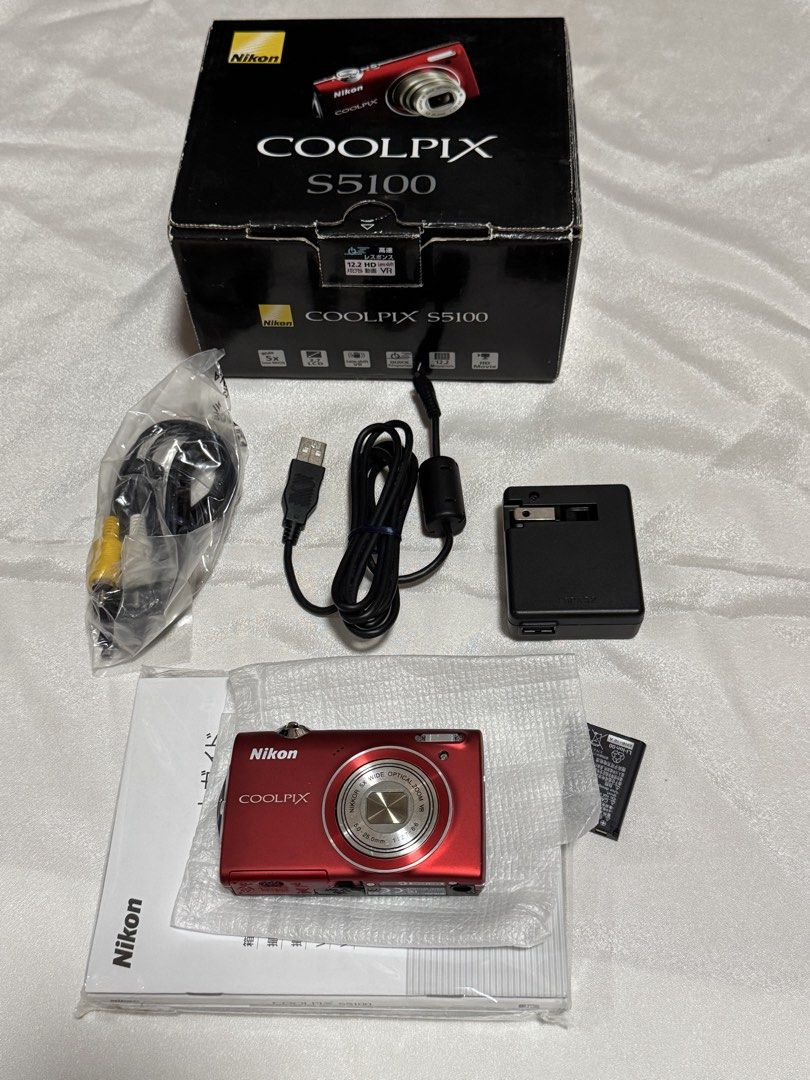 Nikon Coolpix S5100 (Category: Cameras) located in Baguio. Submitted by everythingmustgo2600 (Listing ID 1459963199, Image 1). Description: Nikon Coolpix S5100 Boxed unit with screen protector No functional issue just some minor signs of use lang like scratches (please refer nalang po sa photos). Tapos yung battery niya may signs of use (a little bit bloated pero functioning padin not exhausted pa. for replacement maybe).