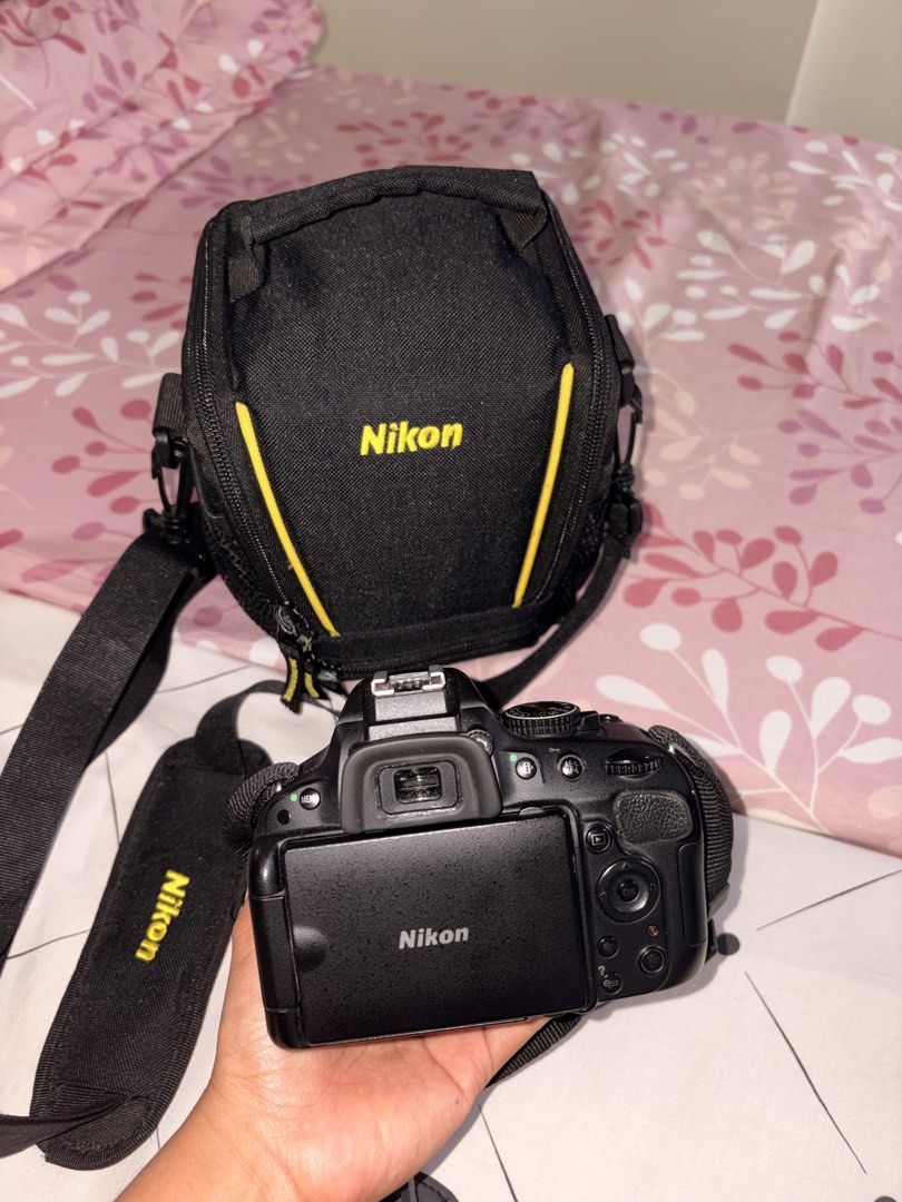 Nikon D5100 (Category: Cameras) located in Manila. Submitted by pepparowni (Listing ID 1460056468, Image 3). Description: Inclusions: Cam bag 2 batteries Lens protector .