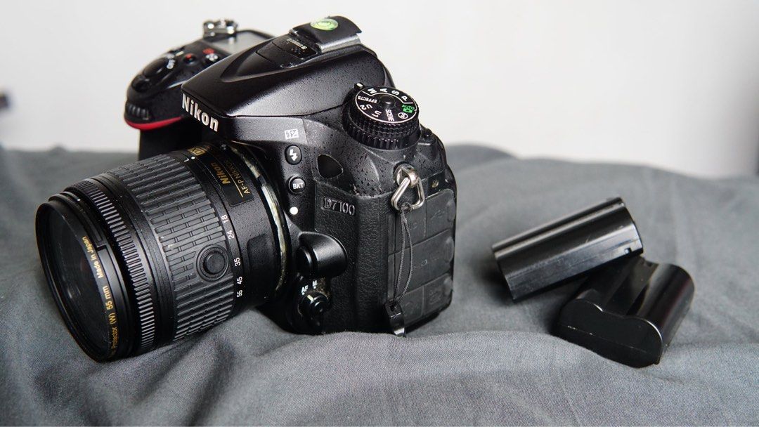 Nikon D7100 (Category: Cameras) located in Cabanatuan. Submitted by geosrno (Listing ID 1459957246, Image 2). Description: Nikon D7100 paired with a Nikon 18-55mm AF-P VR and a 55-200mm VR SC: 46,*** Inclusions: - 16gb SD - Lowepro backpack - 2 original batteries - 1 original charger Condition and issues: - It has some visible battle scars - Viewfindee looks slightly darker around the surrounding area - not sure if it’s a setting or an issue. - D
