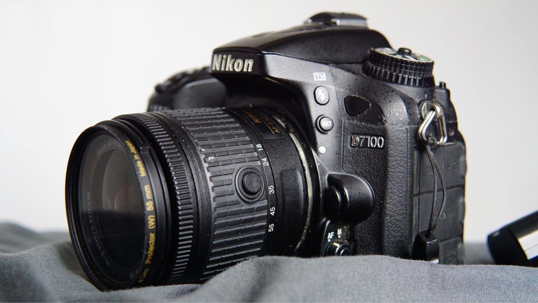 Nikon D7100 (Category: Cameras) located in Cabanatuan. Submitted by geosrno (Listing ID 1459957246, Image 1). Description: Nikon D7100 paired with a Nikon 18-55mm AF-P VR and a 55-200mm VR SC: 46,*** Inclusions: - 16gb SD - Lowepro backpack - 2 original batteries - 1 original charger Condition and issues: - It has some visible battle scars - Viewfindee looks slightly darker around the surrounding area - not sure if it’s a setting or an issue. - D