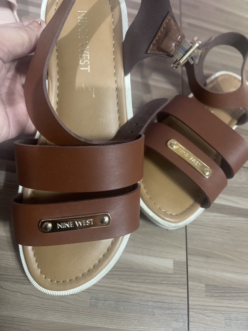 Nine West Brown Leather Strap Sandals (Category: Babies & Kids Fashion) located in Makati City. Submitted by eunice_tr (Listing ID 1459934124, Image 2). Description: - Brand: Nine West - Material: Brown Leather - Design: Two straps across the foot - Closure: Buckle at ankle strap - Comfort: Comfortable sole - Occasion: Great for casual wear Size: 1.