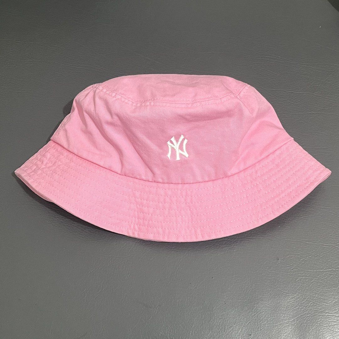 NY MLB PINK BUCKET HAT (Category: Hats & Beanies) located in Sipalay. Submitted by trustmeyoullbefine (Listing ID 1459933035, Image 2). Description: Size 59 cm on tag Fits smal to semi largw heads Good as new No flaws Authentic .