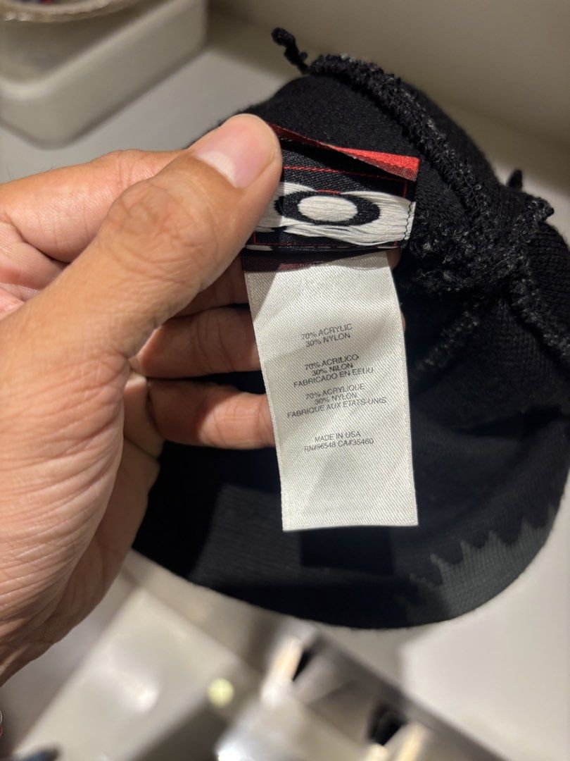 Oakley Black Knit Beanie with Grey Pattern (Category: Caps & Hats) located in Quezon City. Submitted by fordzz (Listing ID 1459971383, Image 3). Description: - Brand: Oakley - Color: Black with cool grey zigzag pattern - Material: Acrylic and Nylon blend - Features: Comfortable knit, keeps you warm - Detail: Oakley logo on inside tag - Condition: Ready for a new owner.