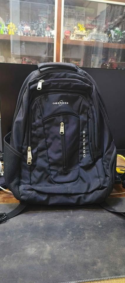 Obersee Backpack (Bought From US) (Category: Backpacks) located in Manila. Submitted by onlinestopshop (Listing ID 1460094416, Image 1). Description: OBERSEE BACKPACK FOR SALE • Original Obersee backpack • Black color • Large capacity with multiple compartments • Fits up to a 15.6" laptop • Padded laptop compartment • Padded airflow back • Complete straps and zippers • Good condition • Clean and ready to use Price: ₱1,200 Slight Neg Originally pu