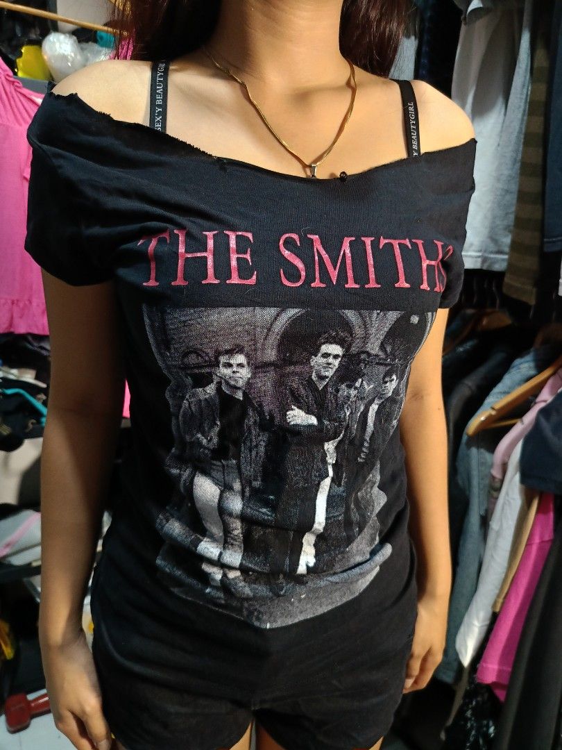 Off shoulder The smiths band tee (Category: Blouses) located in Binangonan. Submitted by uhwhynot (Listing ID 1459913729, Image 1). Description: cut out neck line.
