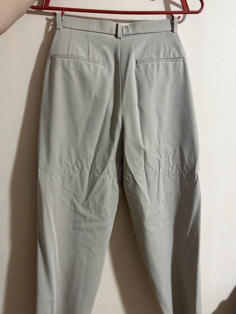 Officewear Cream trousers (Category: Other Bottoms) located in Binan City. Submitted by prelovedbykats_011 (Listing ID 1460056089, Image 2). Description: - cream trousers -uniqlo - medium (waist 63-69cm, hip 88-94cm) - never worn (cant fit on me).