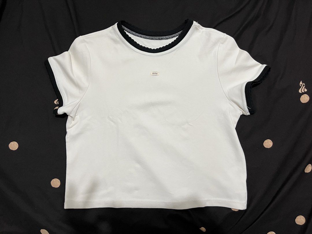 Off-white tee (Category: Blouses) located in Quezon City. Submitted by yan.declutter (Listing ID 1460057910, Image 1). Description: .