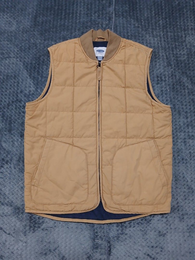 Old Navy Quilted Bomber Vest Tan Size M (Category: Coats, Jackets and Outerwear) located in San Pedro. Submitted by ziamiel (Listing ID 1460011439, Image 3). Description: - Old Navy mustard tan quilted vest - Bomber style with ribbed collar - Zip front closure - Two front pockets - Navy lining - Ideal for layering in cooler weather - Versatile for styling with shirts or sweaters Price:350 Issue:light blue stain posted on pic kindly check but over
