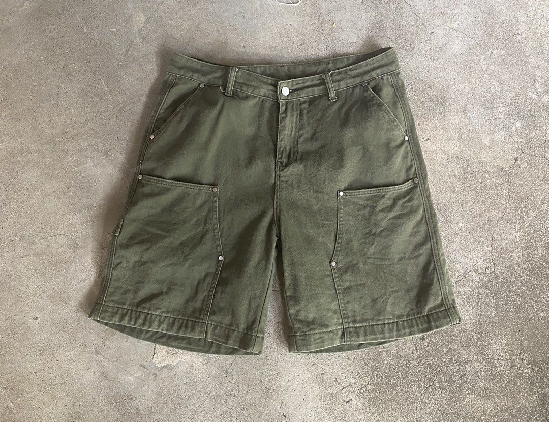 Olive Green Double Knee Shorts (Category: Shorts) located in Manila. Submitted by bapekiddos (Listing ID 1459955484, Image 1). Description: - Size 33-34 - Olive green cargo shorts - Multiple front pockets - Small side utility pocket - Button and zip closure - Comfortable fit - Ideal for casual wear.