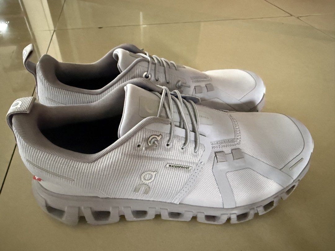 On Cloud Waterproof Running Shoes (Category: Sneakers) located in Subic. Submitted by pampelonne (Listing ID 1459924153, Image 2). Description: - light purple On Cloud waterproof running shoes - Ideal for rainy days and keeping feet dry - Comfortable and lightweight design - CloudTec sole for excellent cushioning - Good grip for stability - Ready for your next run or walk.