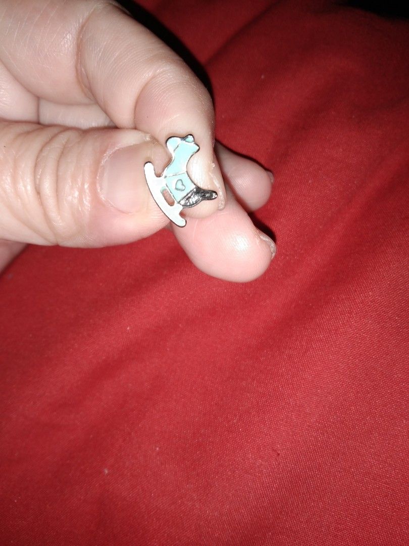 One pc rocking chair stud earrings (Category: Earrings) located in Quezon City. Submitted by eidorableshop (Listing ID 1459905008, Image 3). Description: - Adorable stud earrings set. - Features a rocking horse design with blue enamel and heart details. - Includes a fun soccer ball design. - Perfect for adding a playful touch to any outfit. - Ideal for kids or those who love whimsical accessories. - Lightweight and comfortable for all-day wear..