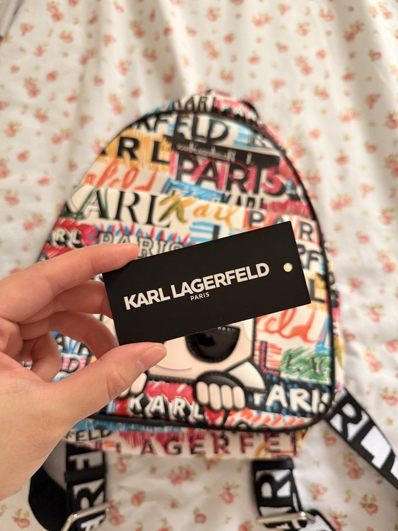(Original) Karl Lagerfeld Paris multi-colored graffiti print backpack (Category: Backpacks) located in Pasig City. Submitted by cosmic_ninisells (Listing ID 1459935914, Image 3). Description: 📌Item: (Original) Karl Lagerfeld Paris multi-colored graffiti print backpack 📌 never used, just stored so item is in very good condition. No dustbag but with tag! Originally bought in the US for $200 (12k pesos) 📌Price: 4,500 negotiable!! send me your off