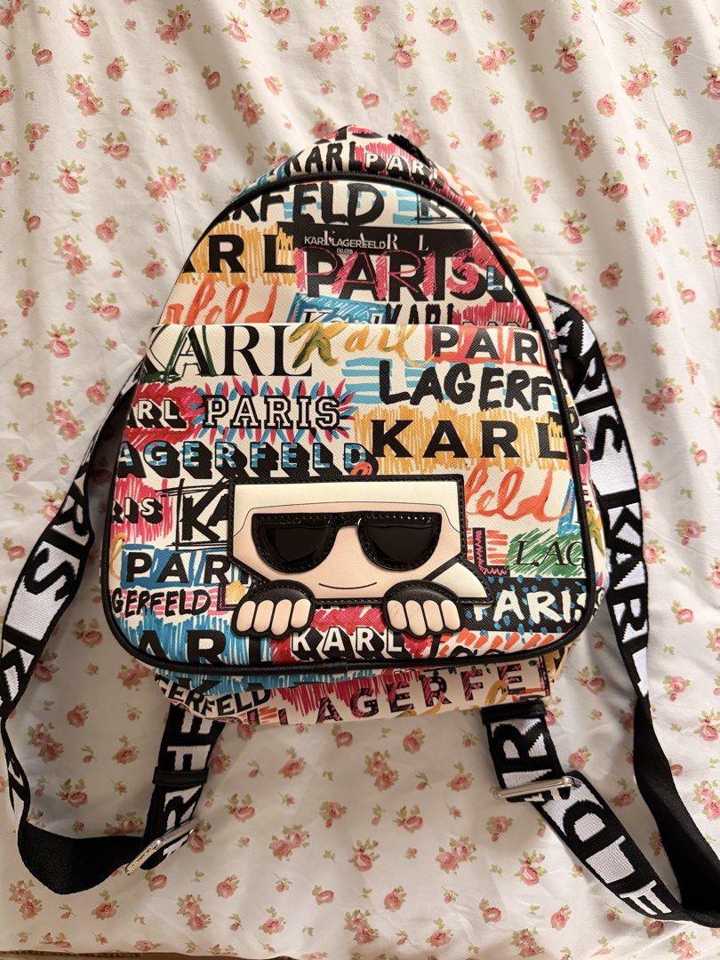 (Original) Karl Lagerfeld Paris multi-colored graffiti print backpack (Category: Backpacks) located in Pasig City. Submitted by cosmic_ninisells (Listing ID 1459935914, Image 1). Description: 📌Item: (Original) Karl Lagerfeld Paris multi-colored graffiti print backpack 📌 never used, just stored so item is in very good condition. No dustbag but with tag! Originally bought in the US for $200 (12k pesos) 📌Price: 4,500 negotiable!! send me your off