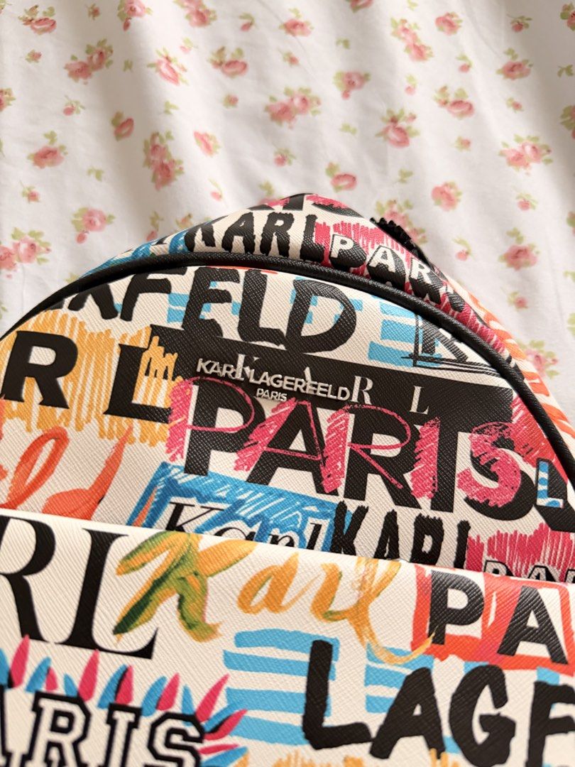 (Original) Karl Lagerfeld Paris multi-colored graffiti print backpack (Category: Backpacks) located in Pasig City. Submitted by cosmic_ninisells (Listing ID 1459935914, Image 2). Description: 📌Item: (Original) Karl Lagerfeld Paris multi-colored graffiti print backpack 📌 never used, just stored so item is in very good condition. No dustbag but with tag! Originally bought in the US for $200 (12k pesos) 📌Price: 4,500 negotiable!! send me your off