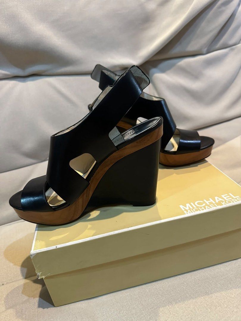 Original Michael Kors Wedge Sandals (Category: Sandals) located in Cavite. Submitted by rubieanne__ (Listing ID 1459991807, Image 2). Description: original mk carla wedge platform size 7 us womens brand new with box ₱1,900 firm.