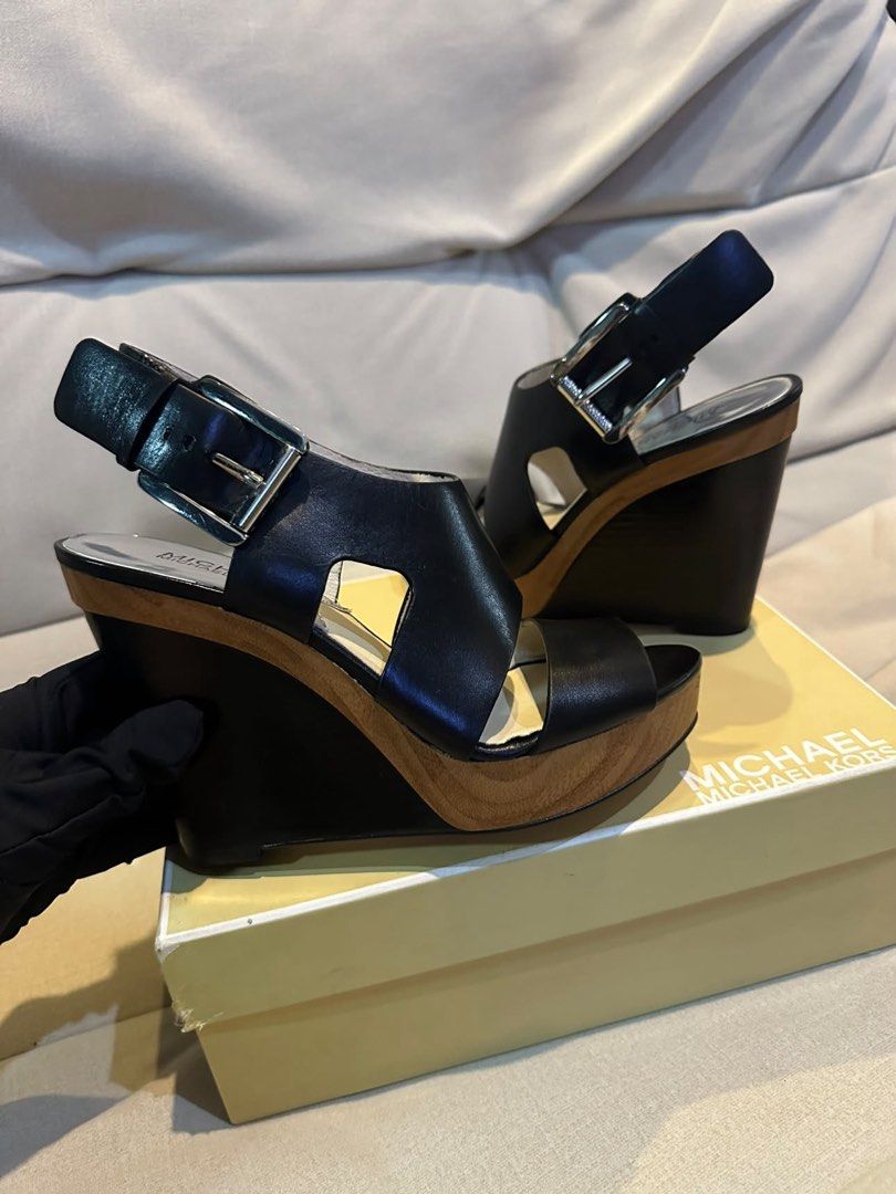 Original Michael Kors Wedge Sandals (Category: Sandals) located in Cavite. Submitted by rubieanne__ (Listing ID 1459991807, Image 1). Description: original mk carla wedge platform size 7 us womens brand new with box ₱1,900 firm.