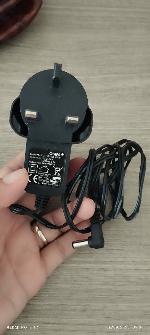 OSIM Power Adapter IVP2400-0500 (Category: Cables & Adaptors) located in Makati City. Submitted by larasdowry (Listing ID 1459906838, Image 1). Description: - OSIM Power Adapter - Model: IVP2400-0500 - Input: 100-240V~50/60Hz 0.3A - Output: 24V 0.5A - Complete with plug and cable - Guaranteed working condition.