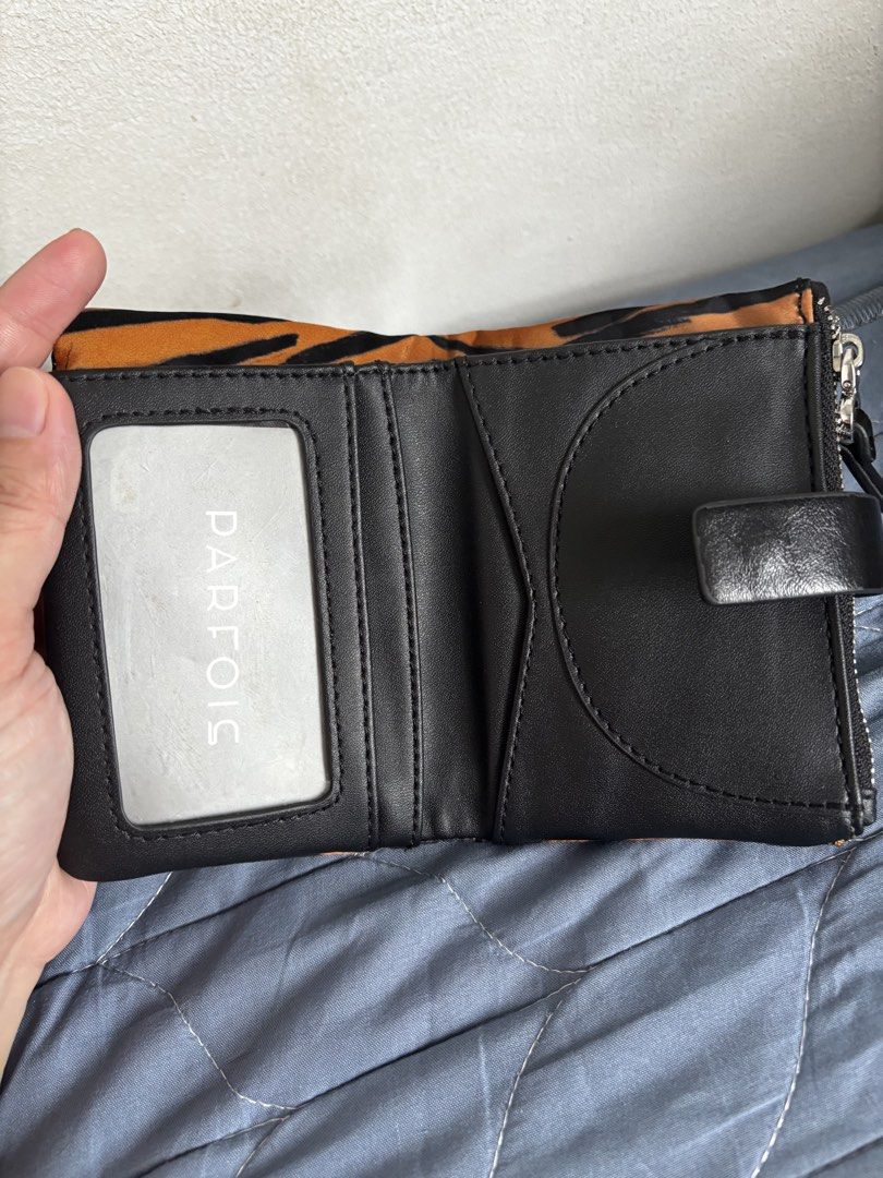 Parfois Tiger Print Wallet (Category: Wallets & Card holders) located in Manila. Submitted by declutter_byjaq (Listing ID 1459985070, Image 3). Description: Parfois Wallet with Detachable Card Holder Used twice only Can pass as Brandnew Misplaced Tag and Receipt RFS: Needs Cash.
