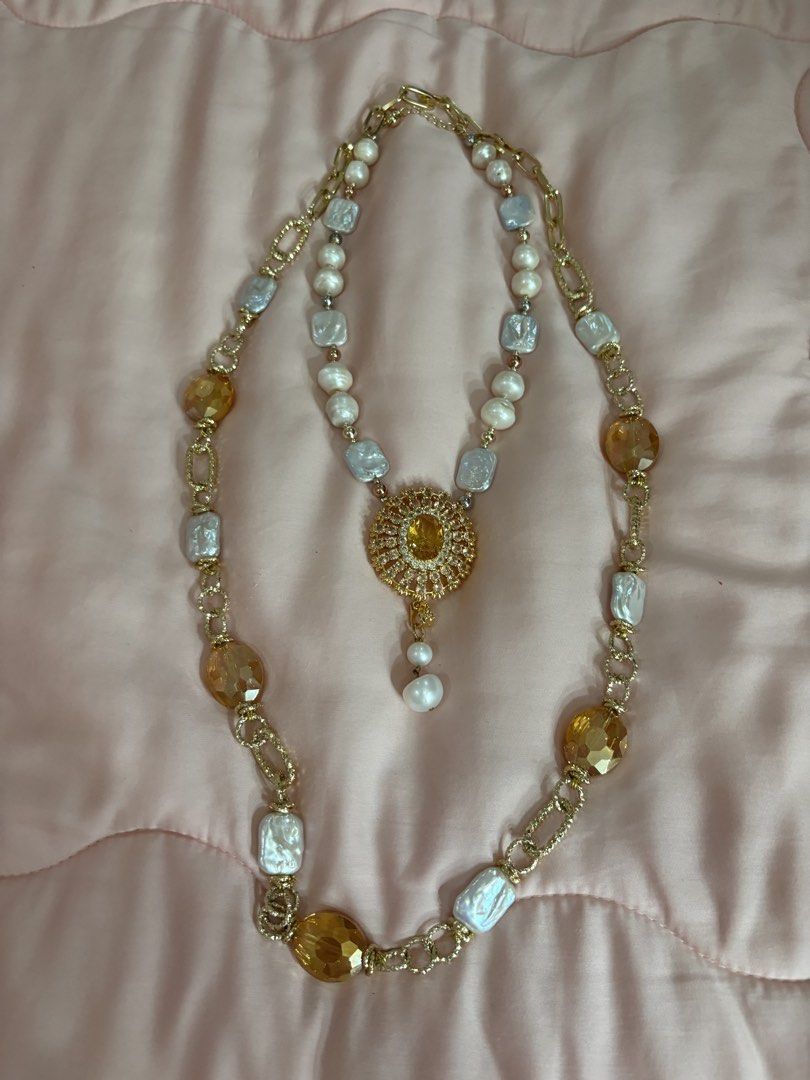 Pearl and Citrine Long Necklace (Category: Necklaces) located in Pasig City. Submitted by aesthetic_dress (Listing ID 1459945888, Image 2). Description: Beautiful statement necklace with real pearl and real citrine fit for royalty Bought from a FB jewelry seller with physical store in Greenhills I was told it is real citrine 2500 pesos for one piece 4000 pesos for both.