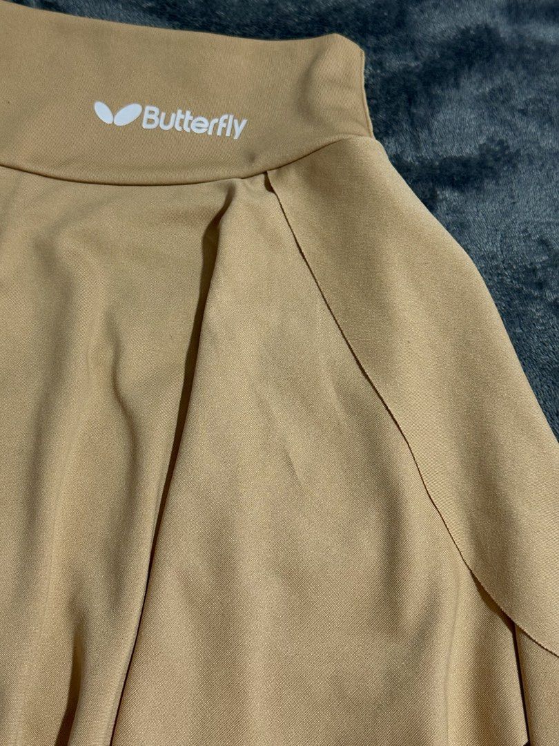 Pickleball/Tennis Skort (Category: Activewear) located in Cebu City. Submitted by ann_4 (Listing ID 1460039152, Image 3). Description: Never used ! Good as new! Size : XS can fit S also Price : 200 pesos - Tan pickleball / tennis skort - Includes built-in shorts for added comfort and coverage - Versatile for sports activities or casual everyday wear - Made with comfortable and stretchy material for ease of movement.