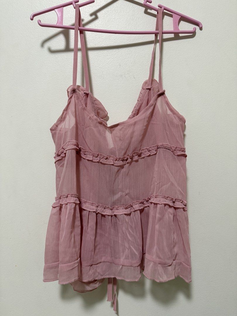 Pink semi transparent cami top (Category: Sleeveless) located in Quezon City. Submitted by clothe.kr (Listing ID 1460049048, Image 2). Description: Used once Runs a bit big, can fit M.