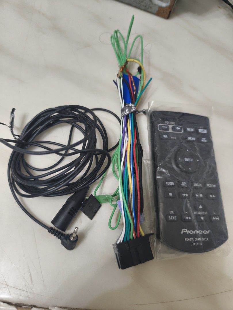 Pioneer Car Stereo Remote Controller & Wiring Harness (Category: Audio, Video, Alarm and other Electronic Accessories) located in Cavite. Submitted by Combiishop (Listing ID 1460051041, Image 1). Description: - Genuine Pioneer remote control for car stereo systems. - Includes a long-cabled microphone. - Comes with a multi-colored wiring harness for easy connection. - Ideal for replacing lost parts or for a fresh installation. - All items are clea