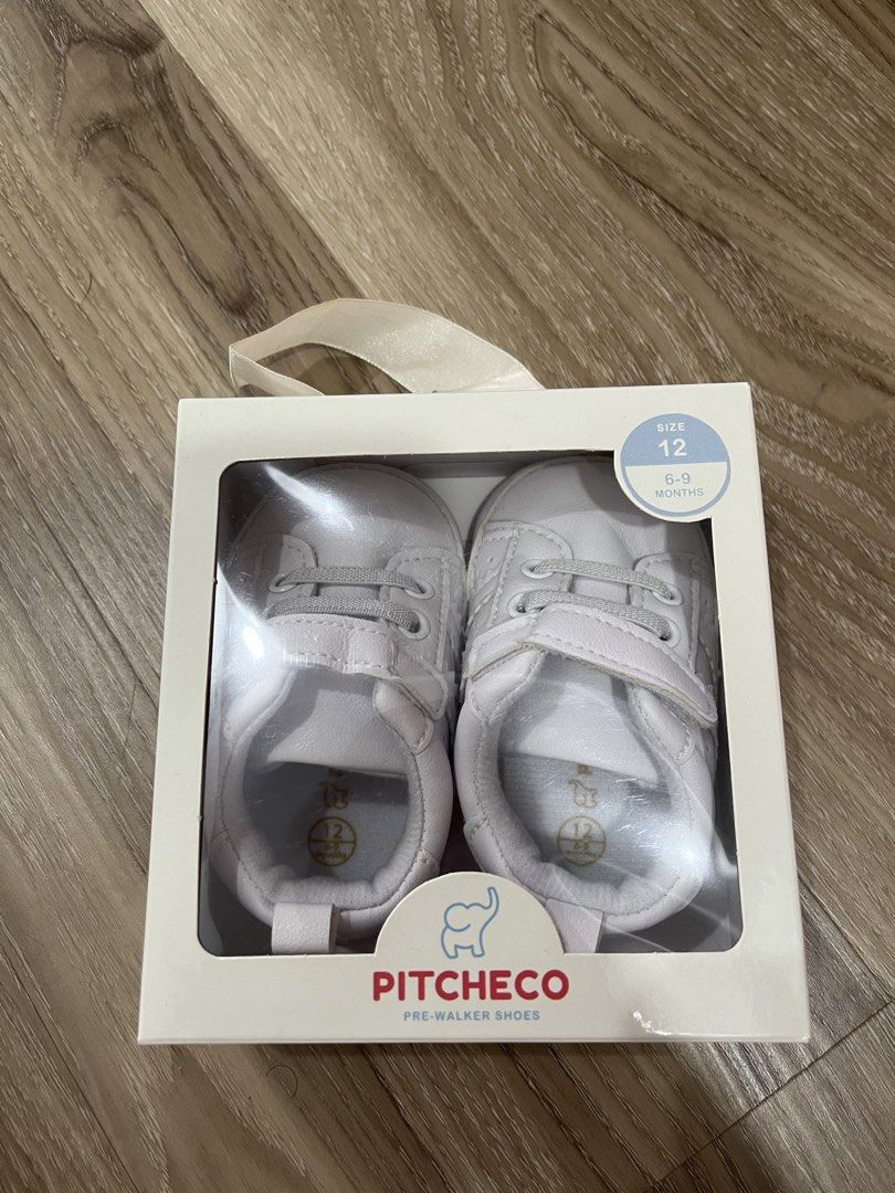 Pitcheco Pre-Walker Shoes White Size 12 (6-9 Months) (Category: Babies & Kids Fashion) located in Manila. Submitted by shannendorithie (Listing ID 1460019015, Image 2). Description: - Brand: Pitcheco - Type: Pre-walker shoes - Color: White - Size: 12 (fits 6-9 months) - Features: Easy velcro strap for quick on/off - Condition: Comes in original box - Ideal for: Babies starting to take their first steps!.