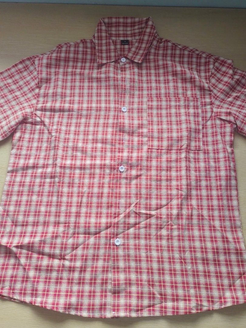 Plaid Button-Up Polo Shirt (Category: Tshirts & Polo Shirts ) located in Quezon City. Submitted by brycine022416 (Listing ID 1460076233, Image 1). Description: - Classic red and white plaid pattern - Button-up front with collar - Short sleeves - Comfortable for everyday casual wear - Approximate measurements: 22" armpit to armpit, 26" length Available - Red - Suble Yellow 350 each, both for 600.