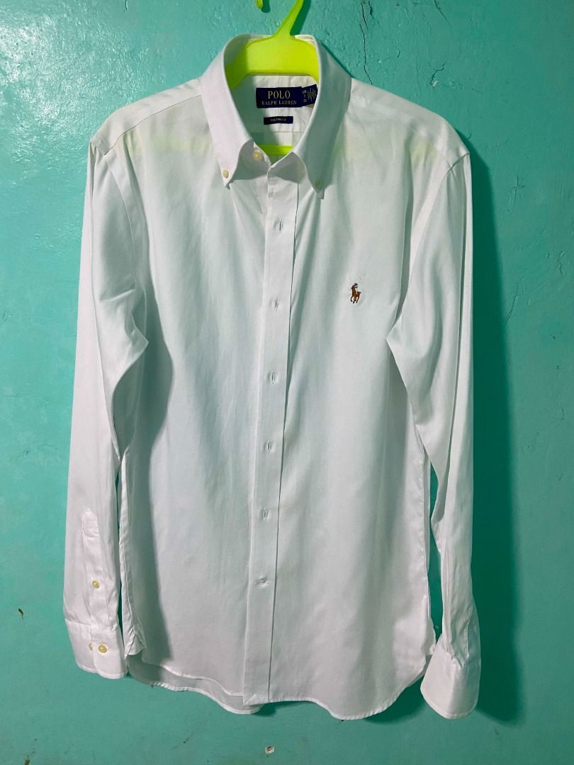 Polo Ralph Lauren White Button Down Shirt (Category: Tshirts & Polo Shirts ) located in Caloocan City. Submitted by newmetho (Listing ID 1459991342, Image 2). Description: 20x29 small on tag fit to medium as new condition no issue .