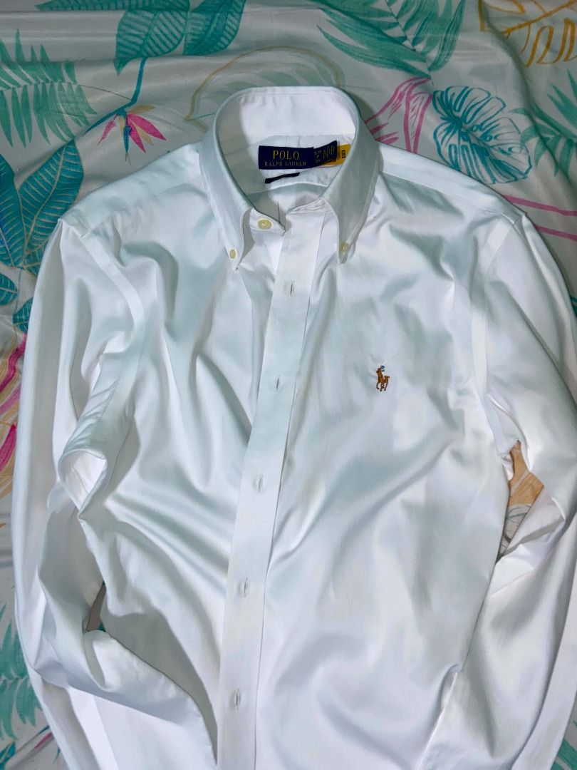 Polo Ralph Lauren White Button Down Shirt (Category: Tshirts & Polo Shirts ) located in Caloocan City. Submitted by newmetho (Listing ID 1459991342, Image 3). Description: 20x29 small on tag fit to medium as new condition no issue .