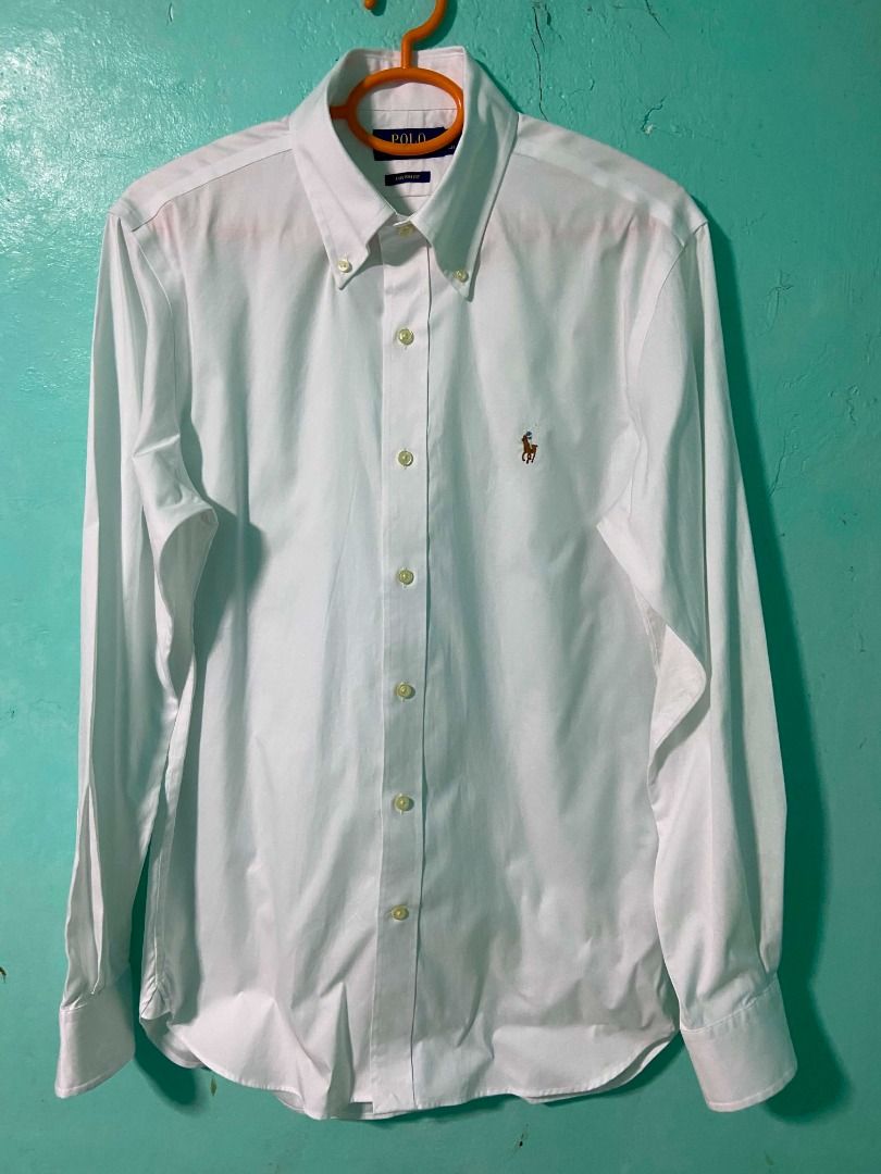 Polo Ralph Lauren White Button Down Shirt (Category: Tshirts & Polo Shirts ) located in Caloocan City. Submitted by newmetho (Listing ID 1459991342, Image 1). Description: 20x29 small on tag fit to medium as new condition no issue .