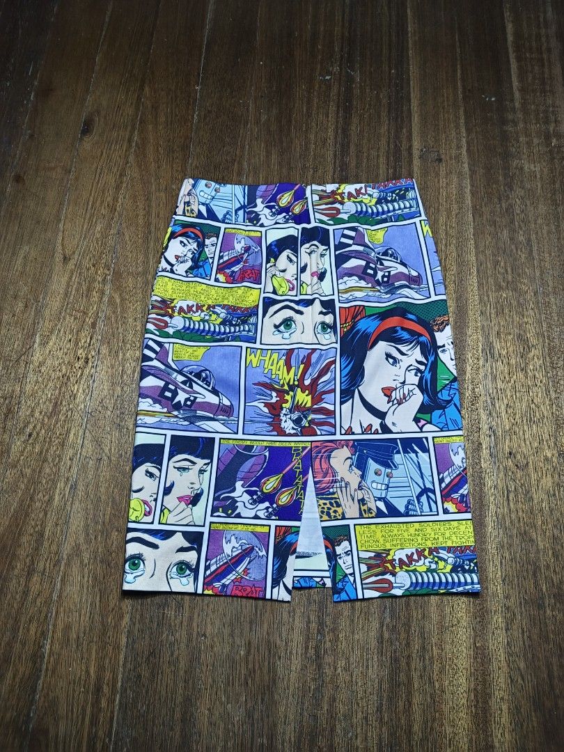 Pop art comic skirt (Category: Skirts) located in Mandaluyong City. Submitted by beloved_kirara (Listing ID 1460063157, Image 2). Description: good condition no issue small on tag dimension waist 26 L 21 700 + sf location mandaluyong willing to meet up as long as it's near my area.