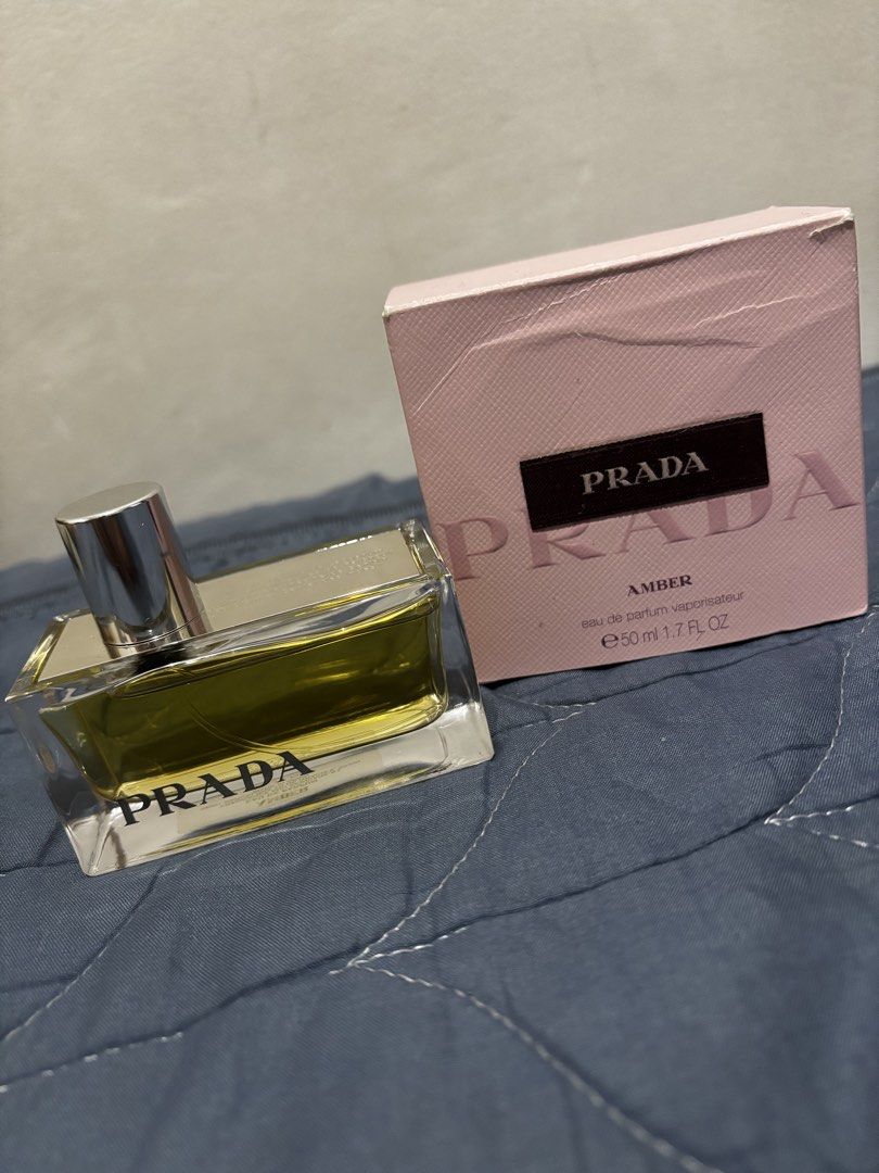 Prada Amber Eau De Parfum (Category: Fragrance & Deodorants) located in Manila. Submitted by declutter_byjaq (Listing ID 1460028340, Image 1). Description: Prada Amber Eau De Parfum 50ml Given as a gift (not my type of scent) From US Brandnew with Box Selling low para mabilis mabili🥰 RFS: Needs Cash.
