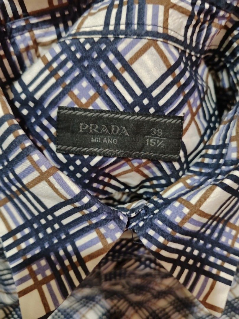 PRADA MEN'S BUTTON-DOWN DRESS SHIRT (Category: Luxury Apparel) located in Roxas, Palawan. Submitted by cabreramed14075 (Listing ID 1459983433, Image 3). Description: PRADA MEN'S BUTTON-DOWN DRESS SHIRT.. MADE IN ITALY EXCELLENT CONDITION COLOR RATE:9.9/10 NO ISSUE. DIMES:19x27 ADD SHIPPING FEE LOCATION PALAWAN.