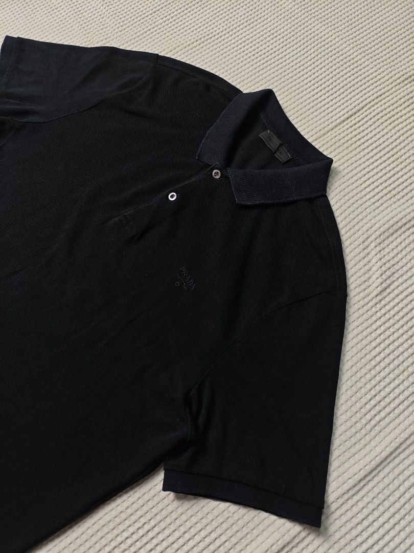 Prada Polo Shirt (Category: Luxury Apparel) located in Dapitan. Submitted by vincesabejon (Listing ID 1459986877, Image 3). Description: Prada Polo Shirt XL On Tag 21" Width 30.5" Length Very Good Condition Sign of usage lang sa collar Php:📥📥📥 Loc: Mindanao Unli vouch and vc for safe transaction!.