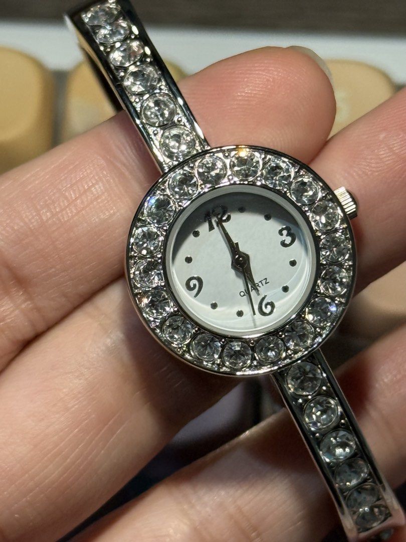 Preloved Avon Bangle with Crystals (Category: Women's Watches) located in Concepcion. Submitted by timeandnumbersatbp (Listing ID 1460017511, Image 2). Description: Preloved Avon Bangle with Crystals ✅ Quartz, Japan movement ✅ Silver tone bangle with complete crystals ✅ 7.25” Note: Item is preloved. Please manage expectations for normal signs of use. .