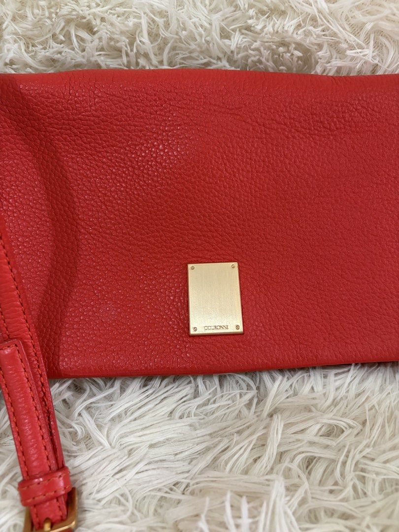 Preloved Couronne Crossbody Bag (Category: Cross-body Bags) located in General Mariano Alvarez. Submitted by maxiscollections (Listing ID 1460047411, Image 2). Description: Preloved Couronne Crossbody Bag Red orange color Like new .