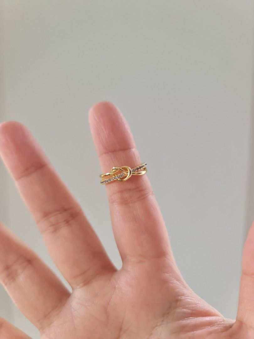 Pretzel Shape Adjustable Gold Stainless Steel Ring (Category: Rings) located in Dasmarinas. Submitted by danabrie22 (Listing ID 1459936909, Image 3). Description: very well-made, excellent crafstmanship 10/10 condition brand new stainless steel & cubic zirconia stones - light green color - adjustable size 5 - 9.