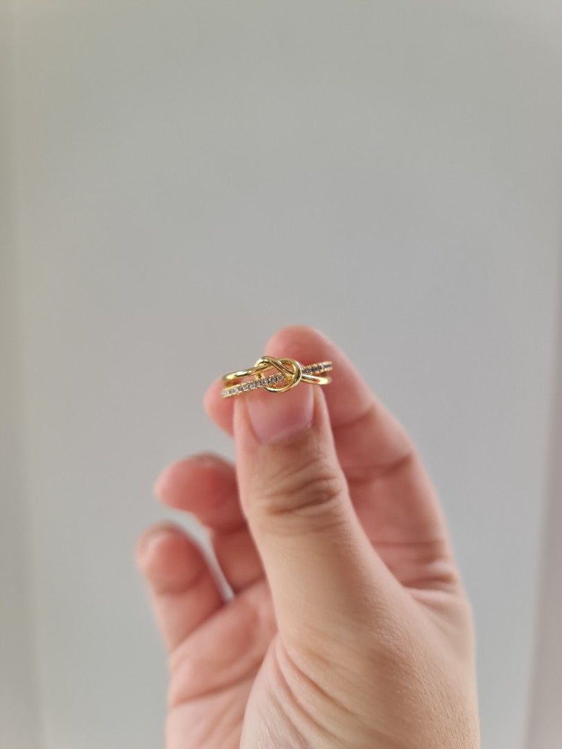 Pretzel Shape Adjustable Gold Stainless Steel Ring (Category: Rings) located in Dasmarinas. Submitted by danabrie22 (Listing ID 1459936909, Image 2). Description: very well-made, excellent crafstmanship 10/10 condition brand new stainless steel & cubic zirconia stones - light green color - adjustable size 5 - 9.