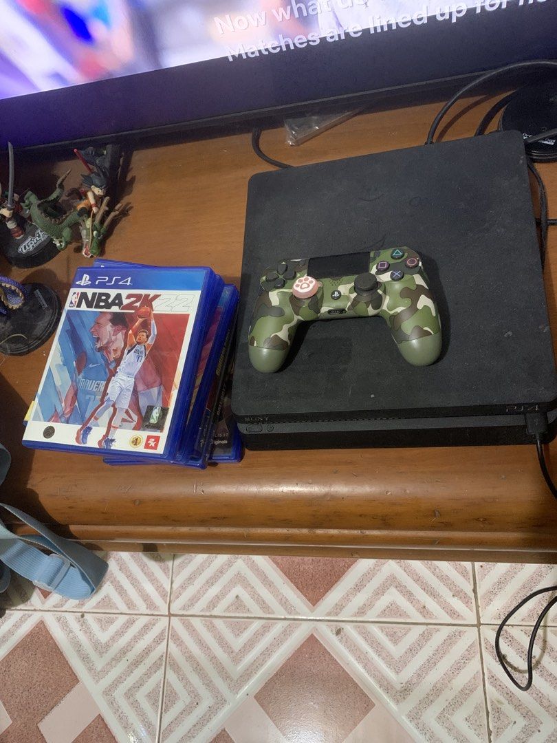 PS4 slim 500gb (Category: PlayStation) located in Quezon City. Submitted by ncjnc (Listing ID 1460049717, Image 1). Description: - PlayStation 4 Console - Camouflage Wireless Controller - Games Included: - NBA 2K24 - Uncharted 4 - Horizon Zero Dawn - God of War - Borderlands: Game of the Year Edition - Call of Duty: Black Ops - Excellent bundle for gamers!.