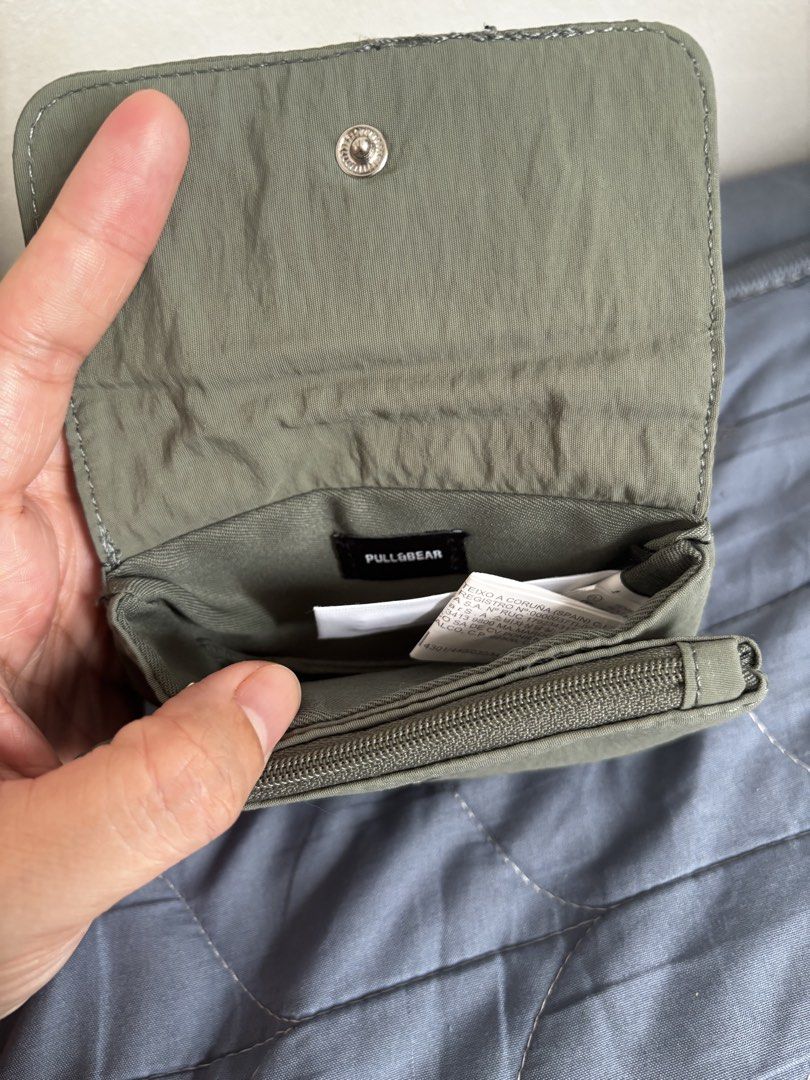 Pull & Bear Pouch (Category: Purses & Pouches) located in Manila. Submitted by declutter_byjaq (Listing ID 1459984337, Image 3). Description: Pull & Bear Pouch Wallet Impulsive Buy Used once only Bought at Pull & Bear SM Megamall RFS: Needs Cash.