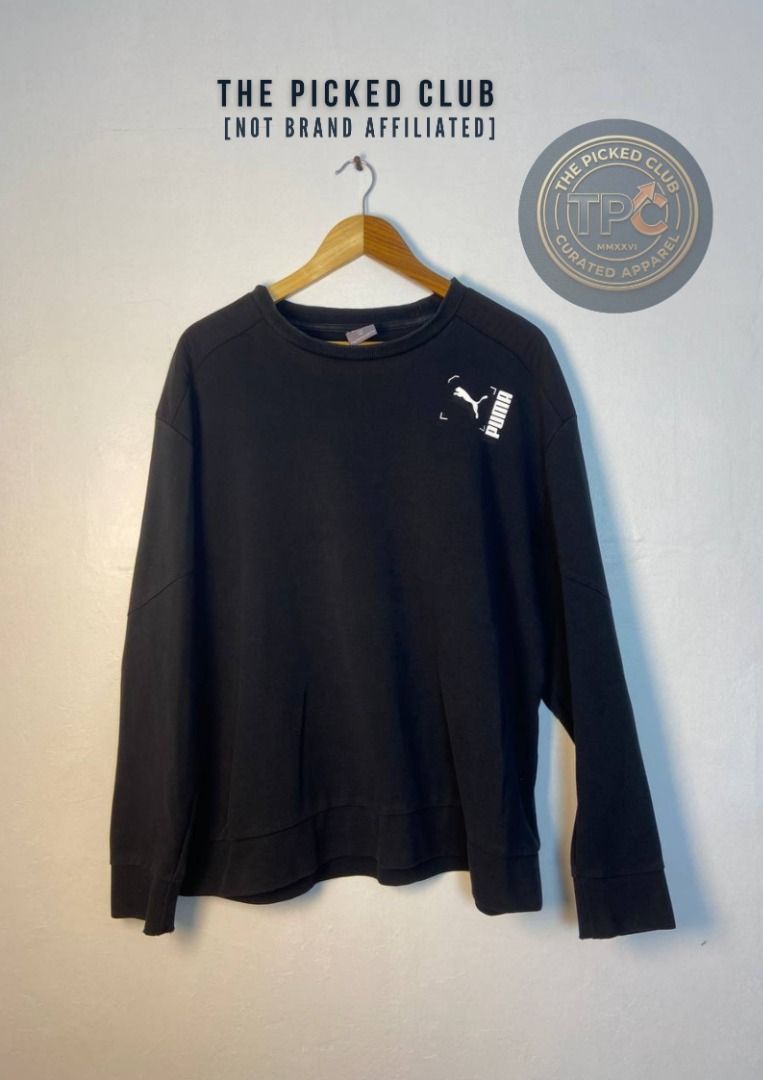 Puma Black Sweatshirt with Logo Detail (Category: Coats, Jackets and Outerwear) located in Imus. Submitted by thepickedclub (Listing ID 1459974978, Image 1). Description: xxl (24.5 x26) - Black Puma sweatshirt - Features iconic Puma logo on chest - Long sleeves and crew neck design - Ideal for everyday casual wear - Offers both comfort and style.