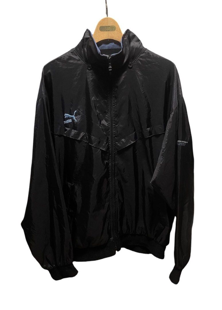 Puma Pro-Tech Sport Black Track Jacket Unisex (Category: Coats, Jackets and Outerwear) located in San Pedro. Submitted by lifebeginsaftercoff33 (Listing ID 1460029952, Image 3). Description: - Black Puma track jacket Unisex - Features iconic Puma logo (Emroiderd)on the chest - Water resistant - 'Pro-Tech Sport' branding on the back collar and inside sleeve - Lightweight material, perfect for casual wear or sports activities, motorcycling - Full z