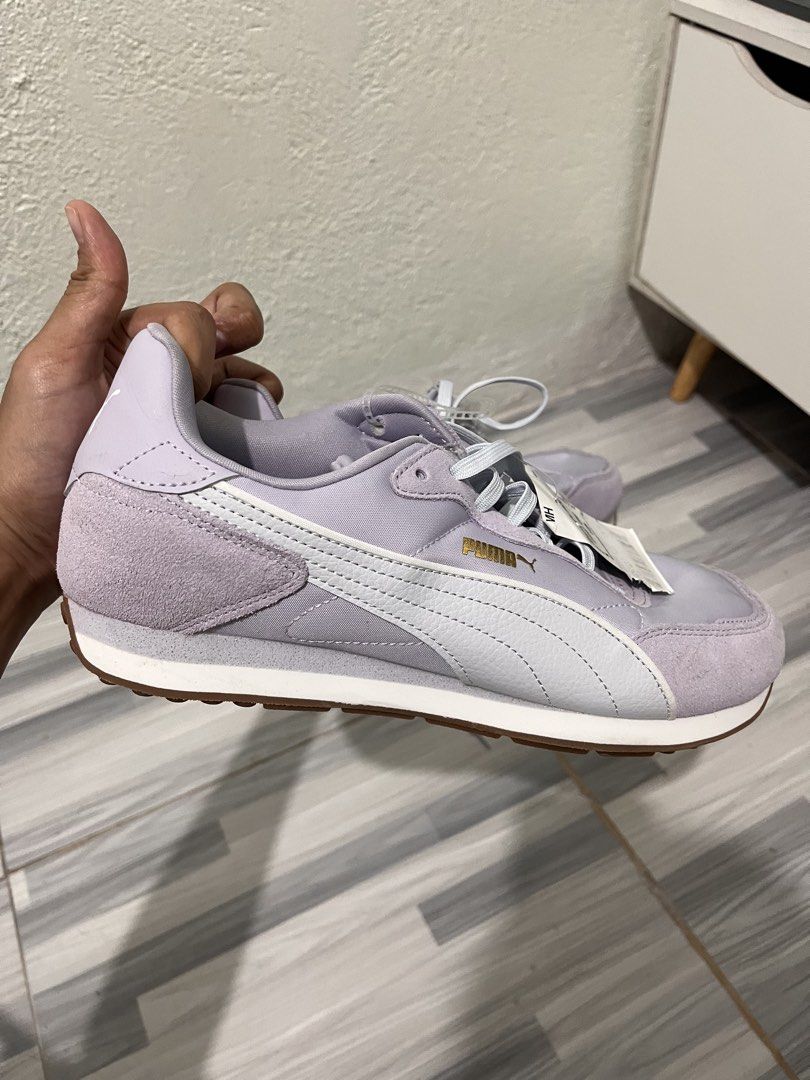Puma SoftFoam Sneakers Lilac Size 10 (Category: Sneakers) located in Quezon City. Submitted by nikuuuul.4 (Listing ID 1460059606, Image 2). Description: - Lilac Puma sneakers - Size: 10 - SoftFoam cushioning for ultimate comfort - Classic Puma design with white accents - Durable gum sole - Ideal for casual wear - Brand new with original tags attached.